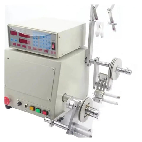 Top Shelf Automatic Cable Winder Reel With Six Thousand Rpm Variable Speed Control And Programmable Step Sequences displaying control panel and winding spindles.
