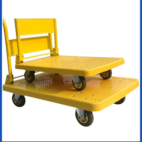 Heavy Duty Folding Flatbed Hand Cart With Knuckle Tough Grip And Silent Swivel Wheels Top Shelf Platform Dolly in yellow with rolling wheels.