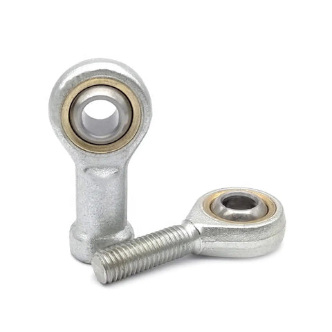 Tough As Nails Metric Rod End Joint Bearings Forged From Corrosion Resistant Steel For Heavy Duty Steering And Suspension Upgrades Delivered With Smooth Rolling Action, close-up of two rod end bearings.