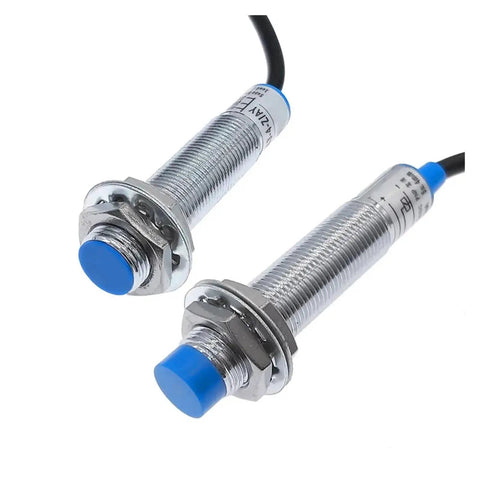 Inductive Proximity Switch Sensor LJ12A3-4 PNP/NPN 4mm Sensing Distance Built Tough Plastic Metal Housing With Smooth Onoff Control For Stable Circuit Switching, Ideal For Industrial Automation, Robotic Arms, And Conveyors. two threaded metal sensors with blue tips