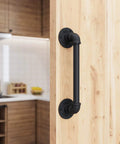 11 Inch Pipe Barn Door Handle Black Rustic Industrial Grab Bar Towel Bar Handrail And Pull For Stairs Gate And Garage Heavy Duty Cast Iron Durable With Round Base And Frosted Black Finish For Everyday Home Use installed on wooden door in kitchen