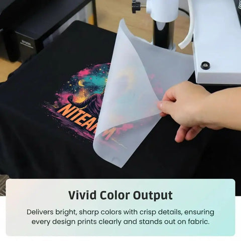 Dark Fabric DTF Transfer Film Roll PET Cold Peel Matte Sheet with vivid color print on black fabric, hand peeling sheet