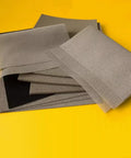 Metal conductive sponge sheets with adhesive backing; gray EMI shielding foam panels stacked (200x300x3.5mm).