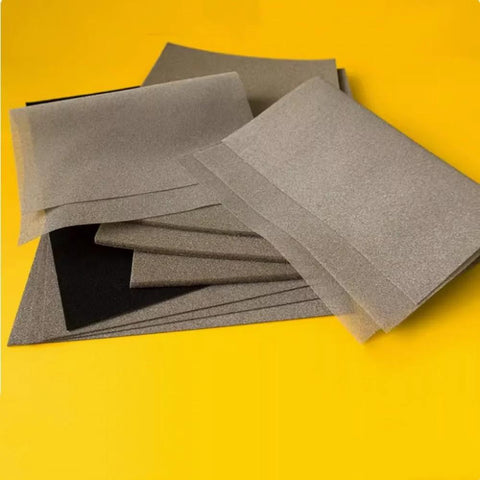 Metal conductive sponge sheets with adhesive backing; gray EMI shielding foam panels stacked (200x300x3.5mm).