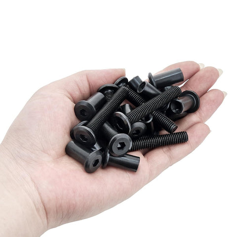 Hand holding 100-Piece M8x50mm Furniture Bolts Kit With Black Hex Screws, Barrel Nuts, And Binding Posts For Furniture Connectors