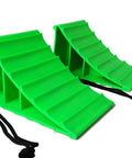Heavy Duty Wheel Chocks Built Tough To Lock Your Rig Down Non Slip Safety Blocks For Rvs Trucks Trailers Campers Cars And Boats High Density Polypropylene Pair shown in bright green color with grooved tread pattern.