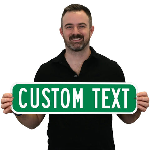 Custom Green Street Signs Personalized Aluminum Yard Decor Rock Solid Heavy Duty Outdoor Message Plate 6 By 24 Inches held by a man.