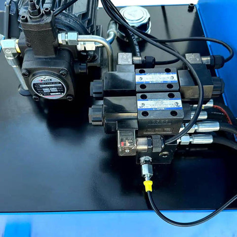 Hydraulic components of Tough As Nails Hydraulic Cold Cut Saw, showcasing pump and valves for efficient operation.