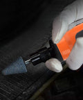 Hand holding Straight Pneumatic Air Die Grinder Kit With Quarter Inch Collet Japanese Style Ergonomic Grip with abrasive stone bit.