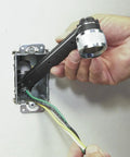 Conduit Locknut Wrench For One Half Inch And Three Quarter Inch Connectors With Direct Drive Heads in use on tight electrical box