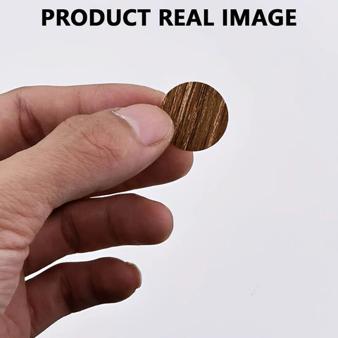 Slick Brown Screw Hole Cover Stickers 108 Piece Self Adhesive Round Caps, 21mm PVC cap held in hand, smooth finish.