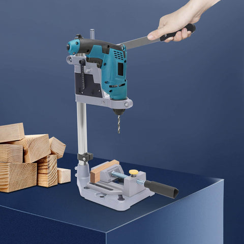Person using Beefy Sturdy Drill Press Adapter Stand For Floor Or Table Use Universal Bench Clamp For Drill Workbench And Repairs Aluminum Base