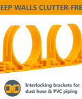 Open Style Dust Collection Pipe And Hose Hangers With Multi Mounting Options For Two And A Half Inch Ducting And Hoses Heavy Duty 4.5 Lb Holding Capacity Five Pack Orange For Wall Mounts In The Shop, showing interlocking orange hangers.