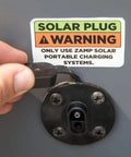 Hand opening solar plug cover with warning label for Solar Panel To SAE Adapter With MC4 Connector Extension Cable 10AWG connection.