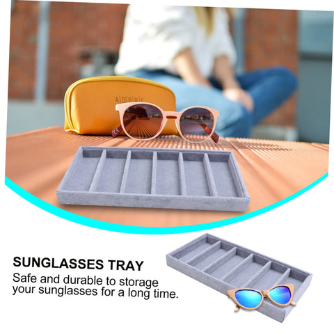 Keep Your Shades Locked And Loaded In This Slick Six Slot Sunglasses Tray And Jewelry Display Holder Crafted From Premium Soft Fabric For Zero Stress Eyewear Organization on a wooden surface with sunglasses and case