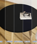Round Spandex Tablecloth With Elastic Edge No Slip Waterproof Stretch Fit For 45 To 56 Inch Tables Ideal For Indoor Outdoor Dining And Camping Picnics Easy Care Washable Black shown on a wooden table with cups and a book.