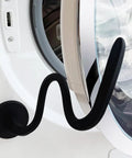 Magnetic Front Load Washer Door Prop and Holder with Strong Magnet and Flexible Hose installed on a washer, sleek black design.