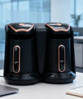Electric Turkish Coffee Maker With Dual Pot Design 1200W 500ml 2 Cup Brew System in an office setting.