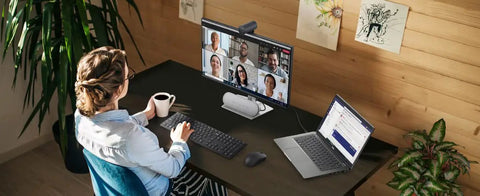 Person using Top Shelf Pro Level 4K Ultra Hd Webcam Featuring Sony Starvis Sensor for Microsoft Teams calls on a computer.