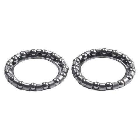 Close-up of Steering Headset Ball Bearings Set Of 4 For Electric Bikes, Durable Steel Construction, side view of bearings.