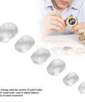 Six Piece Watch Calendar Magnifier Set With Convex Bubble Lenses displayed, watch repair in progress with tools visible.