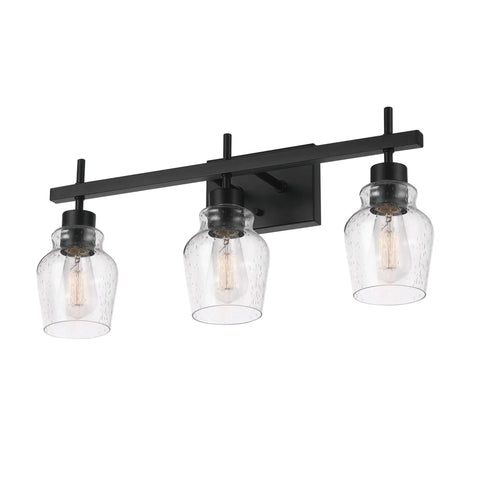 5-Piece All-In-One Matte Black Bathroom Set With 3-Light Vanity Fixture Featuring Seeded Glass Shades Plus Towel Bar, Towel Ring, Robe Hook, And Toilet Paper Holder For A Sleek Modern Industrial Vibe, showing 3-light vanity with seeded glass.