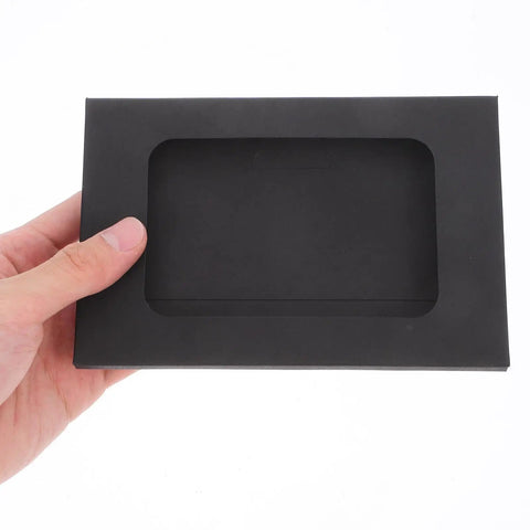Hand holding Black Window Envelopes Set 30 Pack Small Size For Business Cards Photos And Invitations with clear window and flap seal.