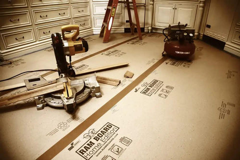 Heavy Duty Floor Protector Roll 36 Inch By 50 Feet for Painting and Remodeling Jobs covering floors during work