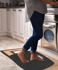 Person using Anti Fatigue Standing Mat With Massage Points For Kitchen And Office, Portable Floor Rug With Built In Handle, 17 by 22 inches, black