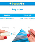 Clear Magnetic Duvet Clips With Magnetic Key For Easy Removal demonstrated over a blue and gray striped duvet