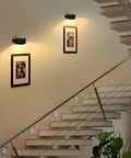 Interior view showcasing Cordless Black LED Wall Sconces With Remote And Touch Dimmer Battery Operated Reading Lights mounted on wall.