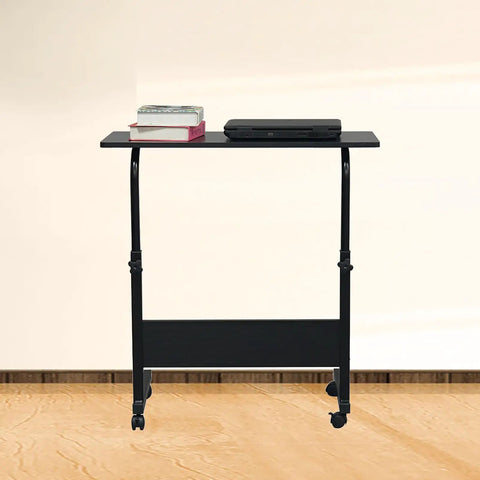 Slick Rolling Adjustable Height Computer Desk With Secure Locking Casters Heavy Duty Steel Frame And Scratch Resistant Top Mobile Standing Laptop Workstation For Tight Home Offices, featuring a compact design with books and a laptop.