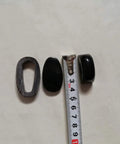 Black Ox Horn Katana Saya Scabbard with Custom Kurigata Koiguchi Kojiri parts next to a measuring tape for size reference.