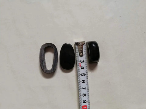 Black Ox Horn Katana Saya Scabbard with Custom Kurigata Koiguchi Kojiri parts next to a measuring tape for size reference.