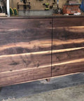 Wood cabinet finished with Wood Furniture Oil For Finish Restore And Protection, VOC Free Polymerizing Cure Oil With Matte Black Finish, Made In USA, FDA Safe Ingredients, 32 Oz Jug.