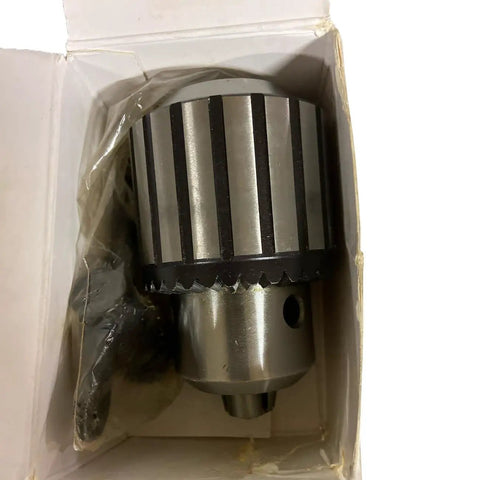 Pro Grade Taper Mount Drill Chuck 0.125 to 0.75 Inch Capacity JT-4 Taper, shown in box with heat-treated alloy steel jaws