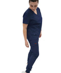 Women's Slim Fit Jogger Scrub Pants With Elastic Yoga Waistband Nurse Medical Uniform, navy color, worn by model, side view.