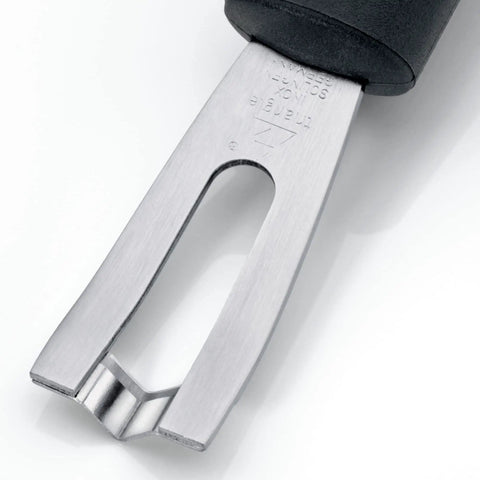 Close-up of Triangular Channel Knife With A V Shaped Stainless Steel Blade For Garnishing Fruits And Veggies, GreenGrip handle.
