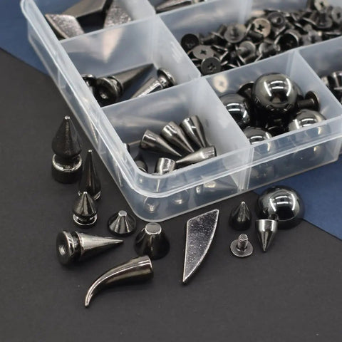 Badass Punk Spikes And Studs Kit 150 Piece Mixed Shape Gun Black Leather Rivets with various shapes in a clear container.