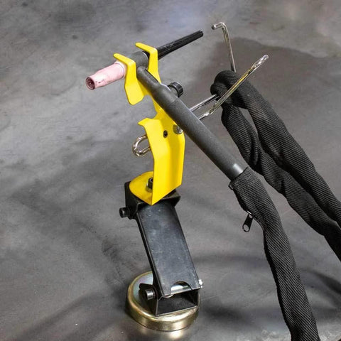 Front view of MRT200 Ready Rest magnetic TIG torch holder with cable hanger; yellow clamp, black base.