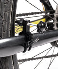 Portable Bike Wheel Truing Stand For Front And Rear Rims Rim Adjustment Tool Lightweight Compact For Easy On The Go Wheel Repair Adjustable Mounting Blue close-up of adjustable mounting on tire