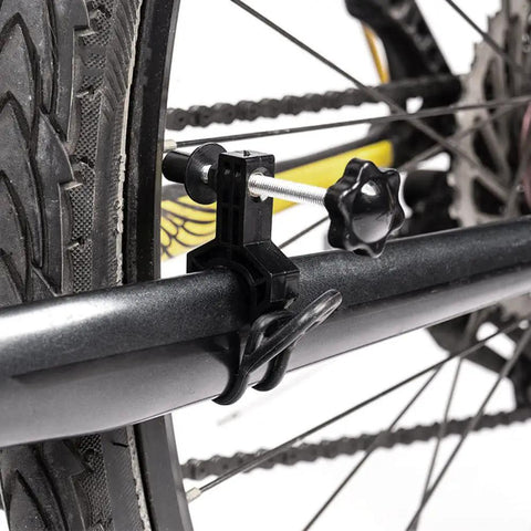 Portable Bike Wheel Truing Stand For Front And Rear Rims Rim Adjustment Tool Lightweight Compact For Easy On The Go Wheel Repair Adjustable Mounting Blue close-up of adjustable mounting on tire