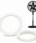 Straight Swap Replacement Pinch Lock Nut For Pedestal Fan Blade Guard Clip Tool Free Hand Tightening Heavy Duty Cage Retainer Rock Solid Secure Hold Keeps Things Running Smooth No Sweat Installation Two Pack with two white pinch lock nuts next to a pedestal fan.