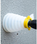 Electric Drill Dust Cover Retractable Rubber Shield For Hammer Impact Drills And Household Power Tools in use on a wall surface