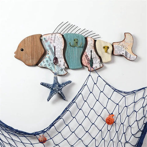 Colorful wooden fish wall decor with starfish and net, perfect for coastal themed rooms, showcasing creative design.