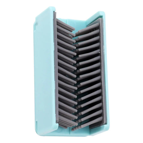Reusable Silicone Hair Catcher Avoid Clogging Bathtub Drain in close-up, showing flexible bristles and adhesive backing.