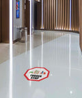 Stop That Tugger Now With These Heavy Duty Red Anti Slip Floor Decals Featuring Tough Round Vinyl Stickers For Warehouses And Factories To Boost Safety And Guide Forklifts Perfectly On Any Surface. Tugger Stop decal displayed on a glossy white surface.