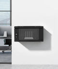 High Quality Premium Daily Driver 6U Wall Mount Server Cabinet With Slatted Vent Cover on a wall in an office setting.