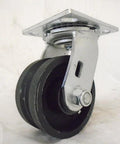 Swivel caster with 4x2 in black iron/steel wheel, 7/8 in V-groove, mounted to a metal plate.
