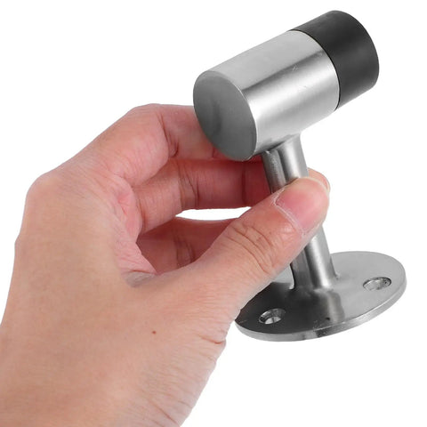 Hand holding Zinc Alloy Door Stopper With Rubber Bumper, Rust Proof And Windproof Design, heightened door wedge in silver finish.